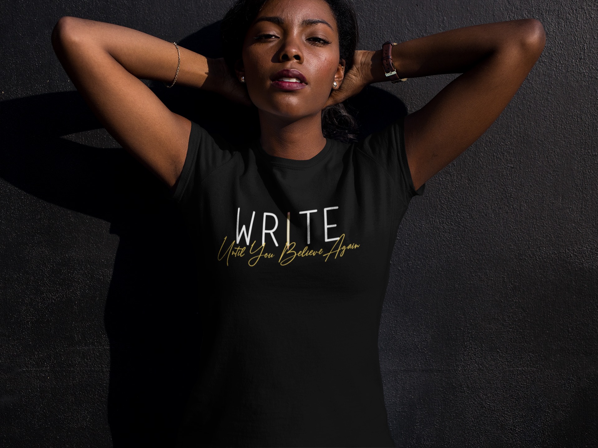 Image of women wearing 'Write Until You Believe Shirt'